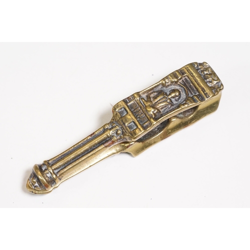 464 - Brass Art Nouveau door knocker together with others modelled as a grandfather clock, The cat and fid... 