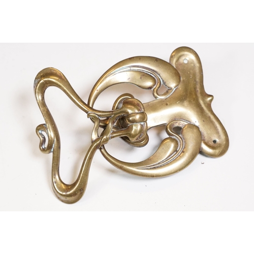 464 - Brass Art Nouveau door knocker together with others modelled as a grandfather clock, The cat and fid... 