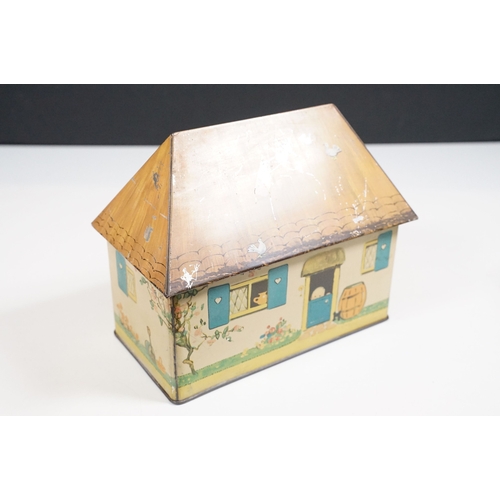 466 - William Crawford & Sons Ltd, Mabel Lucie Atwell 'Kiddibics' vintage biscuit money box in house shape... 