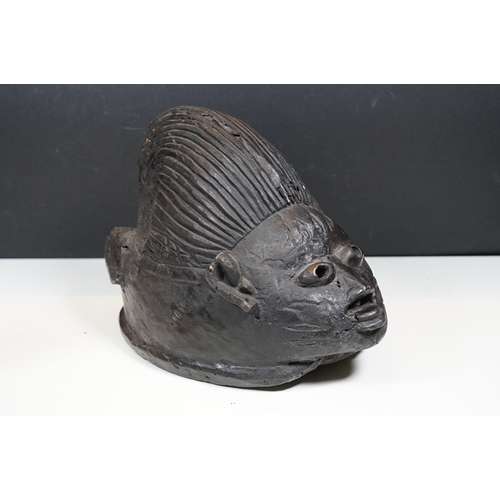 496 - Carved wooden tribal art mask and artefacts including a handled bowl