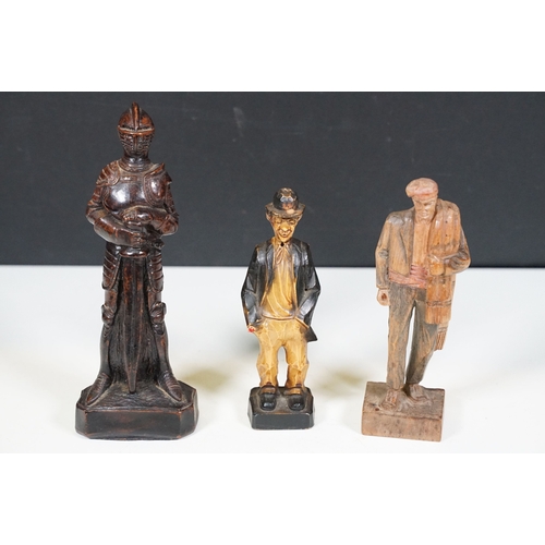 499 - Selection of wooden carved figures to include tank, cobra, pigs, vintage bottle opener set, nut crac... 