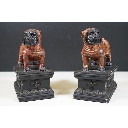 508 - Victorian double sided wooden book stand with handle, W 40cm, together with a pair of bull dog ornam... 