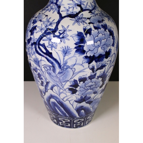 98 - Early 20th century Chinese blue and white baluster vase with bird and flower detail, H 46cm