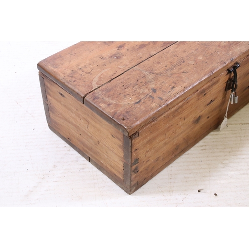 681 - 19th century pine box with hinged lid, 21cm high x 66cm long