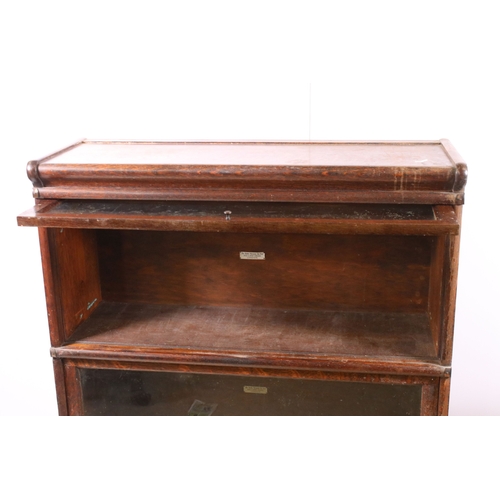 692 - Early 20th century oak 'The Globe-Wernicke Co Ltd' two shelf bookcase with two liftable glazed doors... 