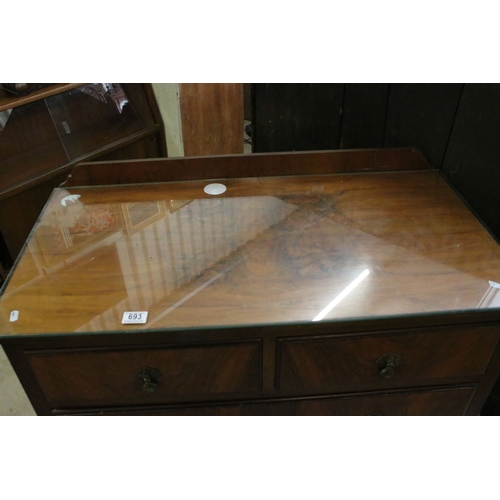 693 - 20th century veneer chest of drawers with glass top cover comprising of two short and three long low... 