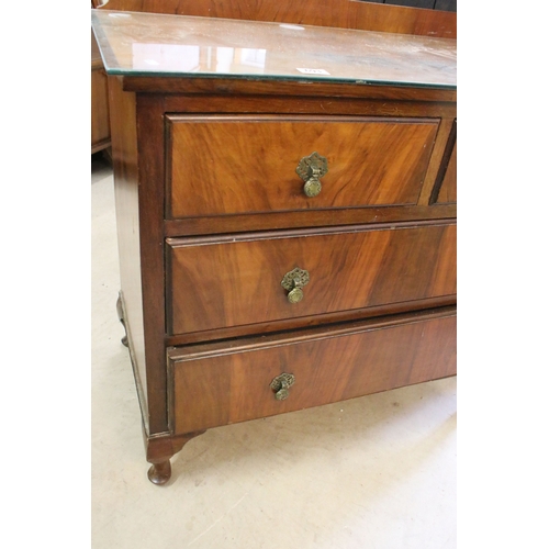 693 - 20th century veneer chest of drawers with glass top cover comprising of two short and three long low... 