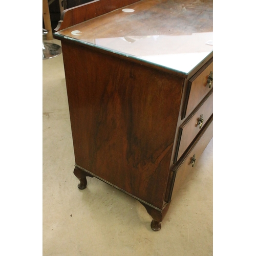 693 - 20th century veneer chest of drawers with glass top cover comprising of two short and three long low... 