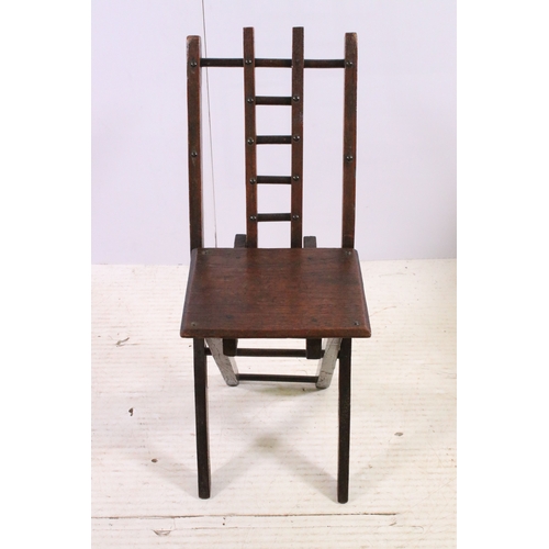 701 - Early 20th century oak folding child's chair with ladder back, H 60cm