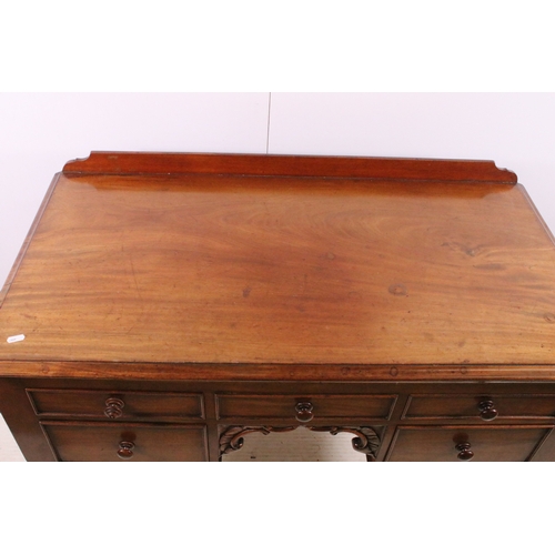 709 - 20th century mahogany dressing wash stand table on turned legs with central carved detail and five d... 