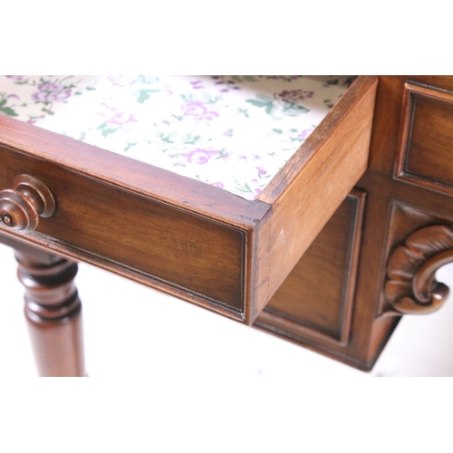 709 - 20th century mahogany dressing wash stand table on turned legs with central carved detail and five d... 