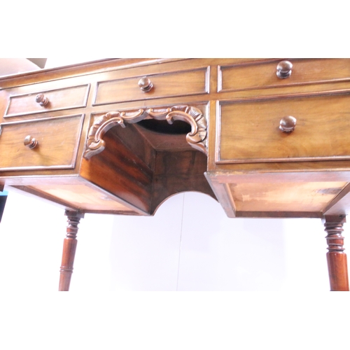 709 - 20th century mahogany dressing wash stand table on turned legs with central carved detail and five d... 