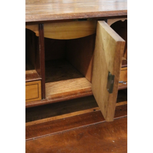 710 - Mahogany writing bureau with fold down front with fitted interior together with four lower long draw... 