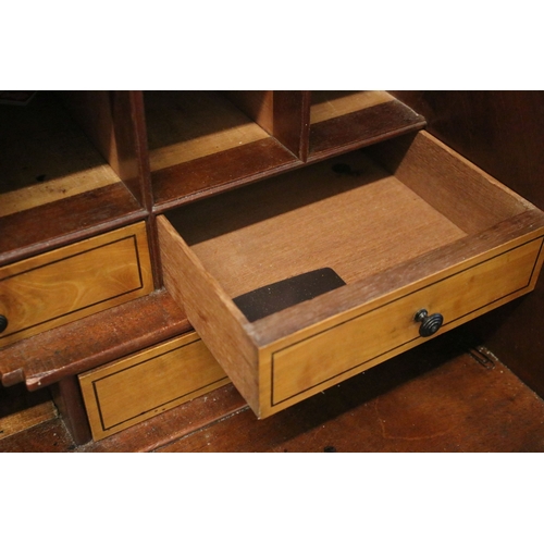 710 - Mahogany writing bureau with fold down front with fitted interior together with four lower long draw... 