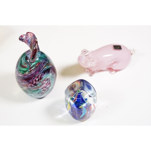 130 - Selection of mixed coloured glass to include Caithness dolphin vase, assorted paperweights, blue gla... 