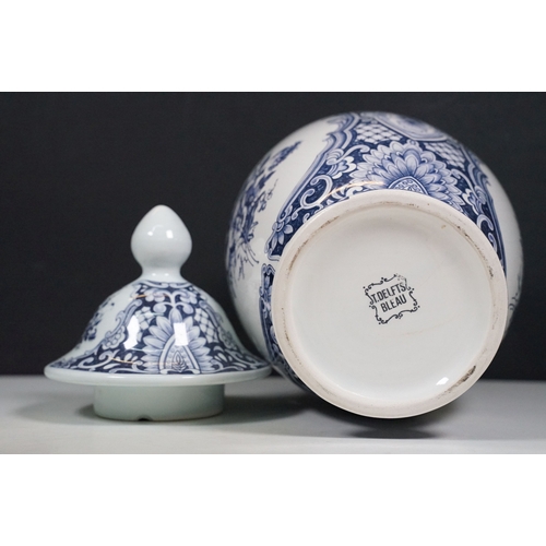 134 - Blue and white pattern T. Delfts Bleau ginger jar and pair of vases together with Royal Sphinx delft... 