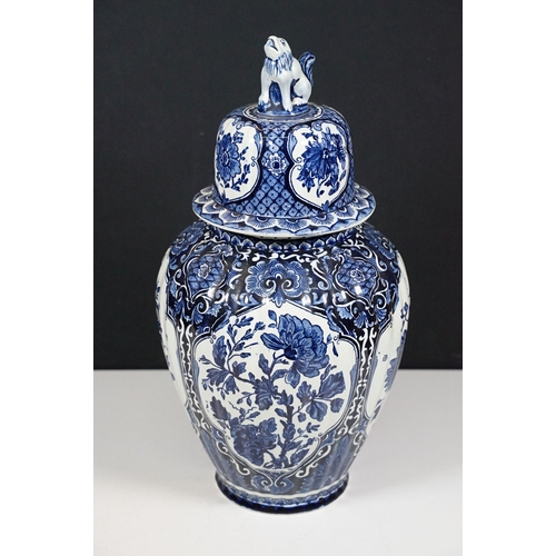 134 - Blue and white pattern T. Delfts Bleau ginger jar and pair of vases together with Royal Sphinx delft... 