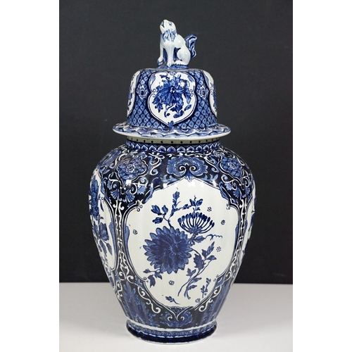 134 - Blue and white pattern T. Delfts Bleau ginger jar and pair of vases together with Royal Sphinx delft... 