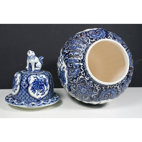 134 - Blue and white pattern T. Delfts Bleau ginger jar and pair of vases together with Royal Sphinx delft... 