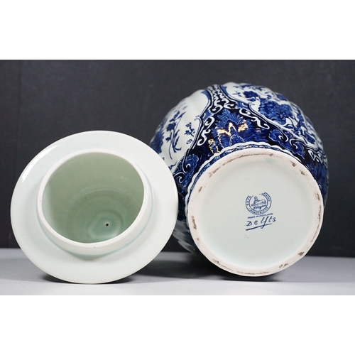 134 - Blue and white pattern T. Delfts Bleau ginger jar and pair of vases together with Royal Sphinx delft... 