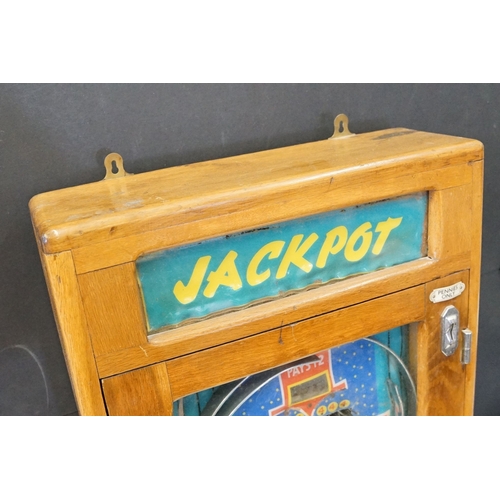 209 - 20th century Whales Redcar 'Jackpot' wooden cased Penny Arcade Machine, with keys, H 80cm, W 46cm, D... 