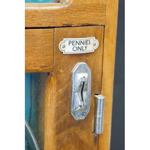 209 - 20th century Whales Redcar 'Jackpot' wooden cased Penny Arcade Machine, with keys, H 80cm, W 46cm, D... 