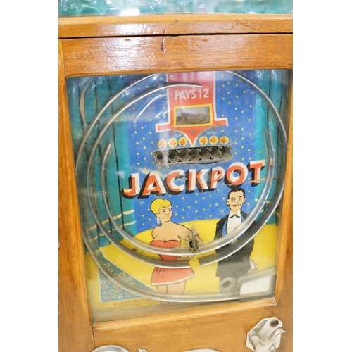 209 - 20th century Whales Redcar 'Jackpot' wooden cased Penny Arcade Machine, with keys, H 80cm, W 46cm, D... 