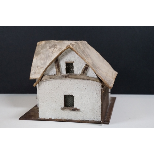 353 - A vintage scratch built model of a farmhouse, stands approx 16cm in height.