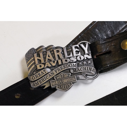 361 - A genuine official Harley Davidson belt buckle together with another buckle, both mounted to leather... 