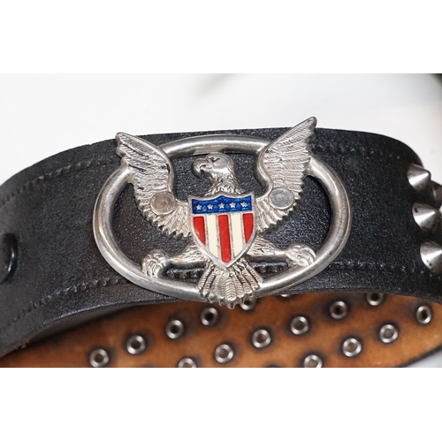 361 - A genuine official Harley Davidson belt buckle together with another buckle, both mounted to leather... 