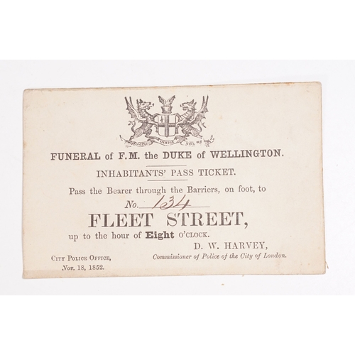 368 - A small collection of ephemera to include a Duke of Wellington funeral ticket, a piece of a Zeppelin... 