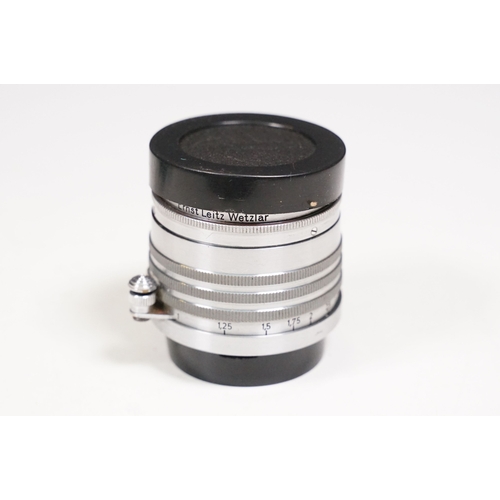 371A - Leitz Xenon f=5cm 1:1.5 No.90684 D.R.P lens with plastic end covers and carry pouch