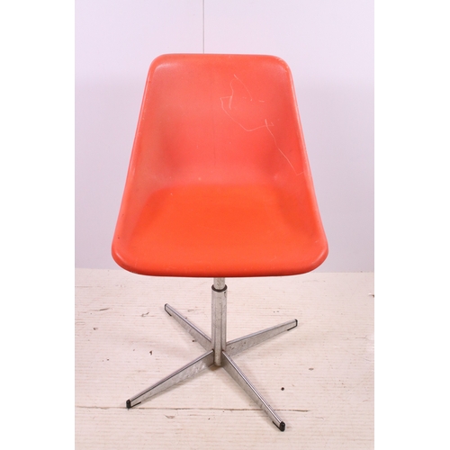 663 - Set of three 1960's Robin Day Design, orange Hille swivel chairs, raised on chrome supports, stamped... 