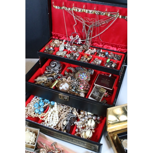 329 - A large collection of mixed vintage costume jewellery to include earrings, rings, necklace and brace... 