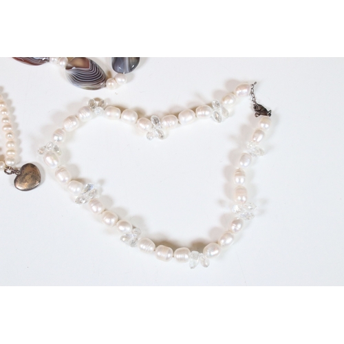 335 - Collection of pearl necklaces to include five cultured pearl examples and two simulated pearl neckla... 