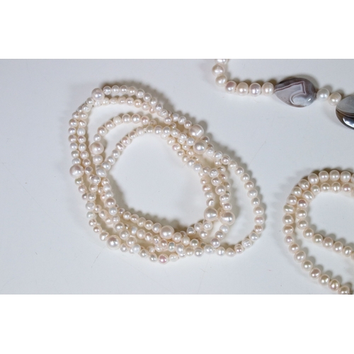 335 - Collection of pearl necklaces to include five cultured pearl examples and two simulated pearl neckla... 