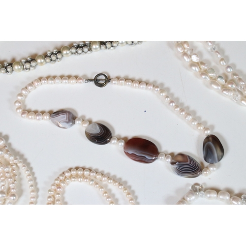 335 - Collection of pearl necklaces to include five cultured pearl examples and two simulated pearl neckla... 