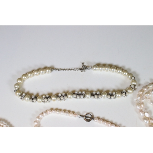 335 - Collection of pearl necklaces to include five cultured pearl examples and two simulated pearl neckla... 