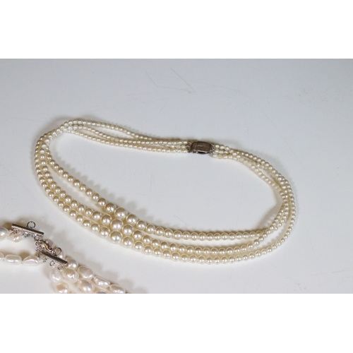 335 - Collection of pearl necklaces to include five cultured pearl examples and two simulated pearl neckla... 