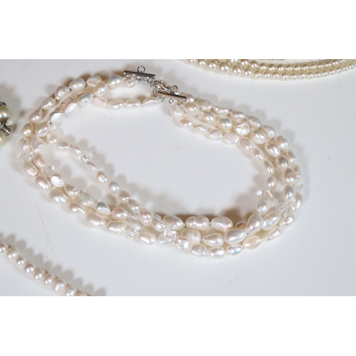 335 - Collection of pearl necklaces to include five cultured pearl examples and two simulated pearl neckla... 