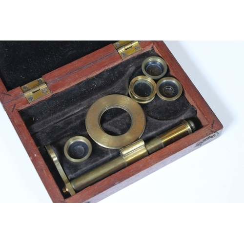 336 - A antique improved compound microscope within original fitted wooden case complete with accessories ... 