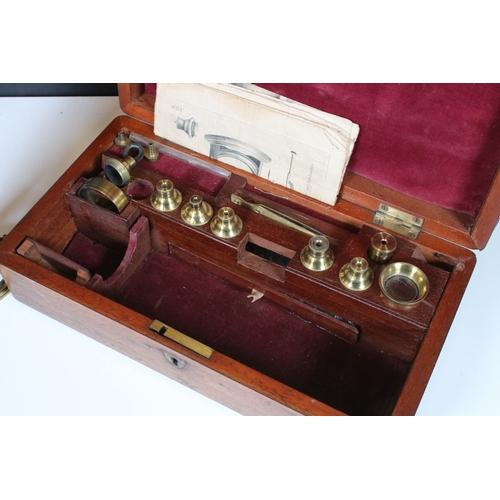 336 - A antique improved compound microscope within original fitted wooden case complete with accessories ... 