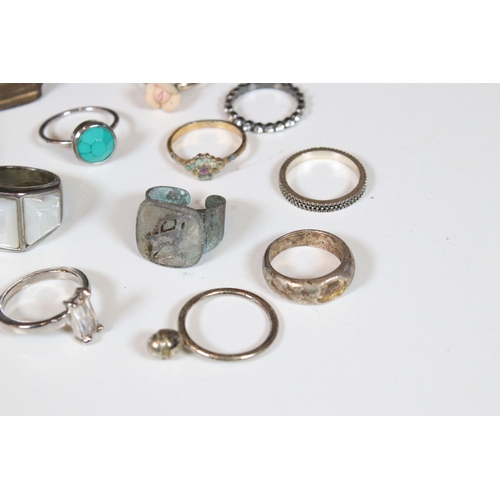 378 - A collection of costume jewellery rings within a glass paneled casket.