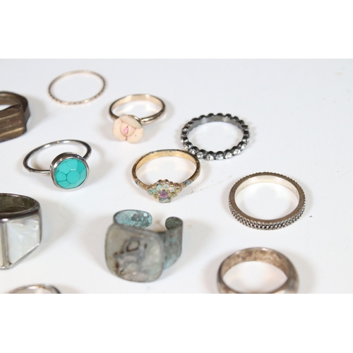 378 - A collection of costume jewellery rings within a glass paneled casket.