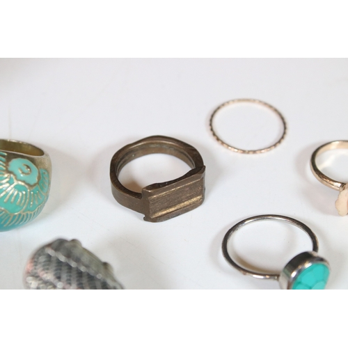 378 - A collection of costume jewellery rings within a glass paneled casket.