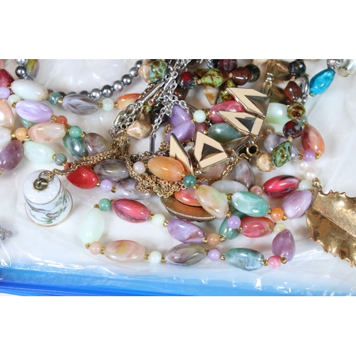 381 - A collection of mainly vintage costume jewellery to include necklaces, rings and brooches together w... 