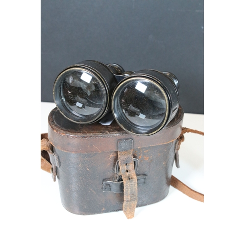 382 - Three pairs of vintage binoculars to include Prisma field binoculars together with optical collectab... 