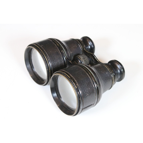 382 - Three pairs of vintage binoculars to include Prisma field binoculars together with optical collectab... 