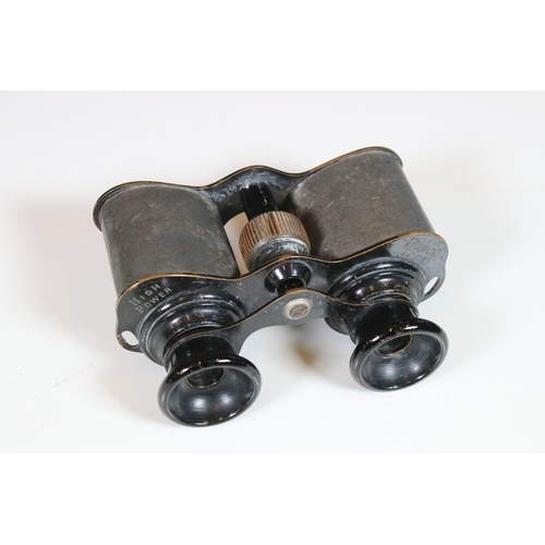 382 - Three pairs of vintage binoculars to include Prisma field binoculars together with optical collectab... 