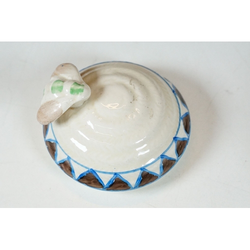 14 - Bizarre by Clarice Cliff hand painted bee hived shape Art Deco honey pot with bee lid, H 9cm, base d... 